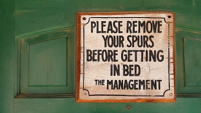 antique sign remove spurs before getting in bed