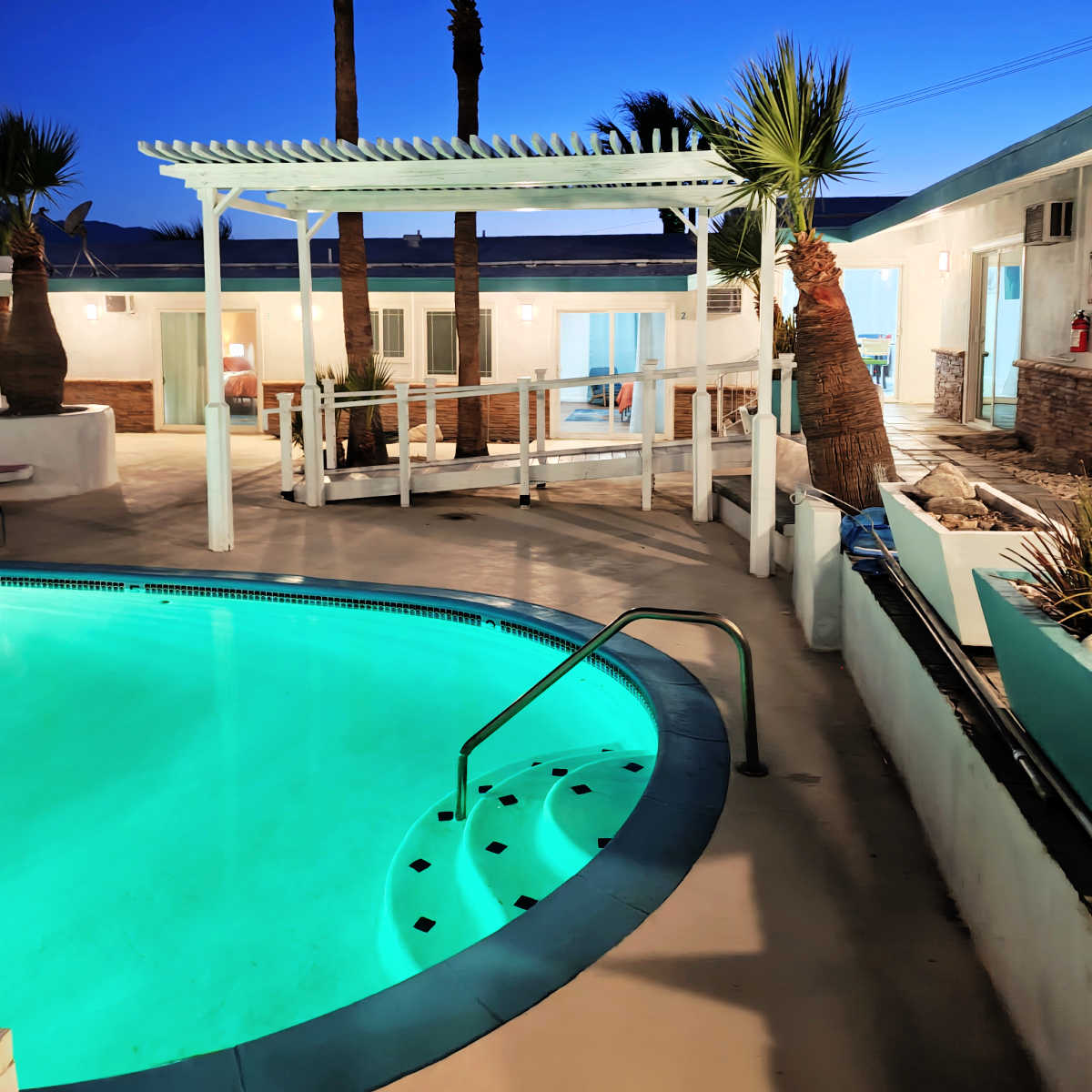spa-tel spring house resort pool nighttime