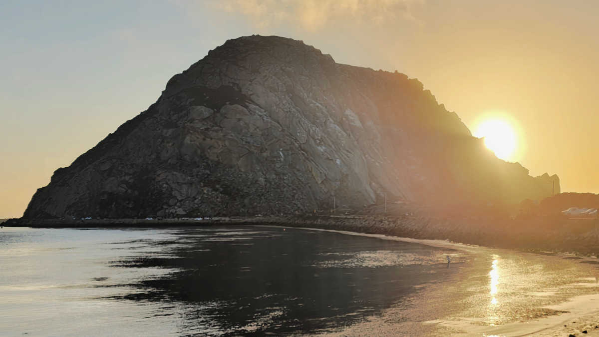 sunsetting behind morro rock